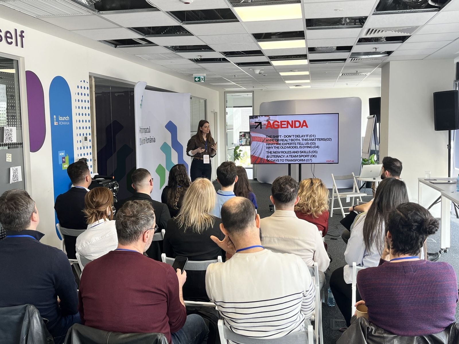 AI training workshop by VEKT AI: founder Adriana Ignat presenting a session on AI literacy and new team roles to a full room in Bucharest
